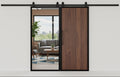 The mirrored barn door features a mirror on the front and a wood finish on the back.
